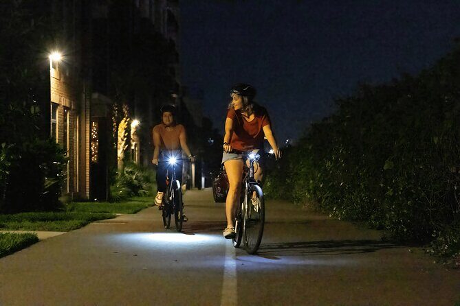 Orlando Night Bike Tour: A Fun Ride Thru the City’s Nightlife - Orlando Urban Trail murals and a protected bike overpass